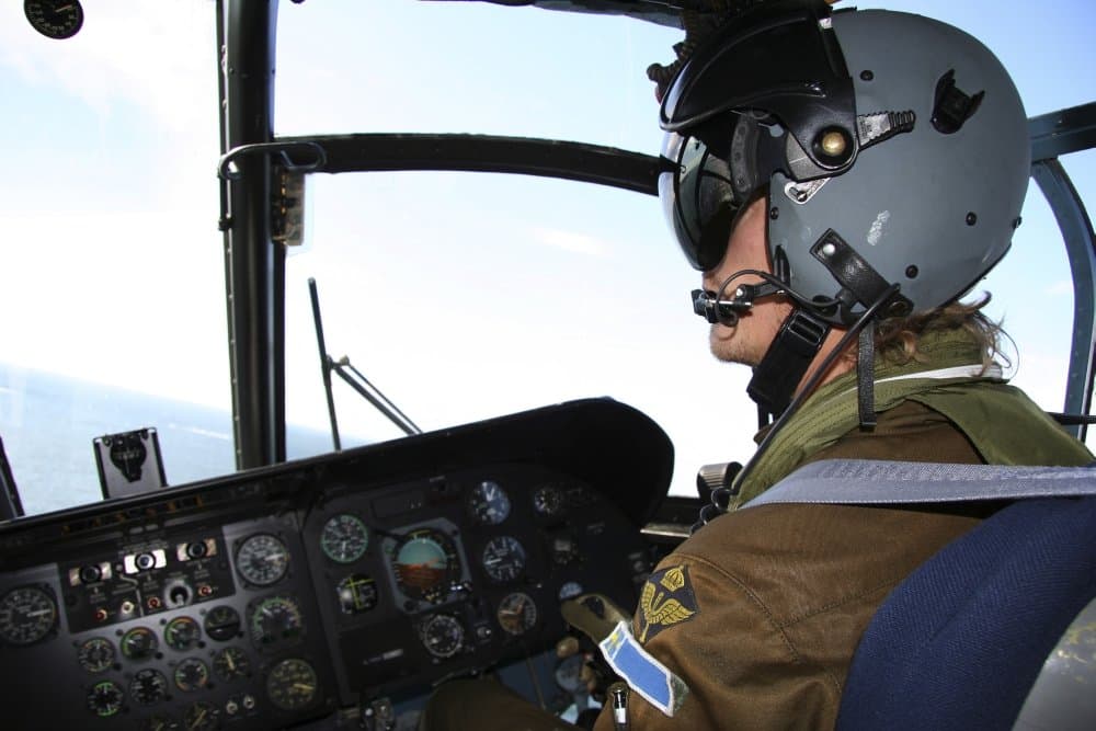 Pilot in the cockpit of a Boeing Vertol CH-46 Sea Knight helicopter of the Swedish Air Force Poster Print (17 x 11)