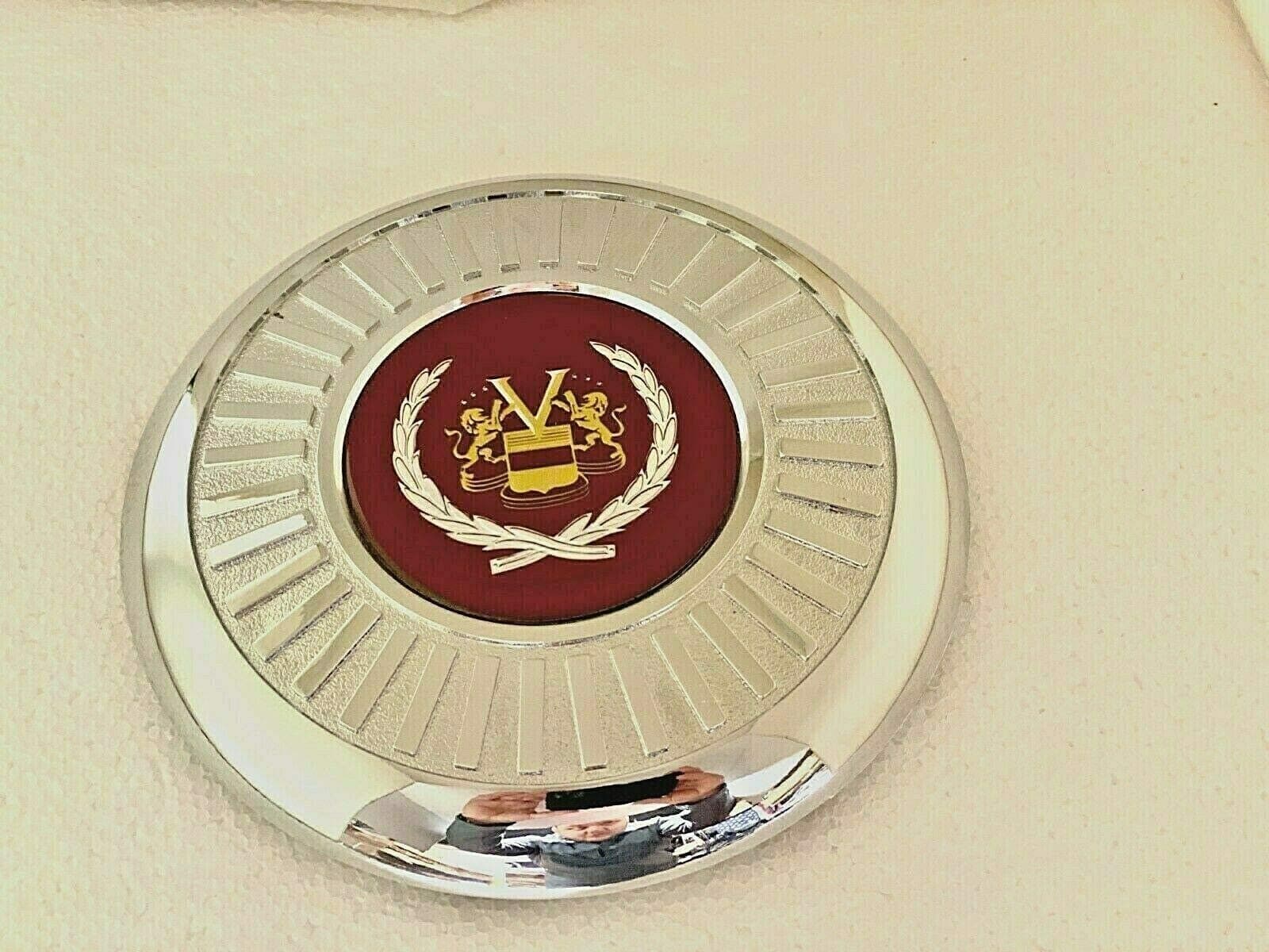 SET OF FOUR APPLIANCE WIRE WHEEL CENTER CAPS (FWD WHEEL) 00250