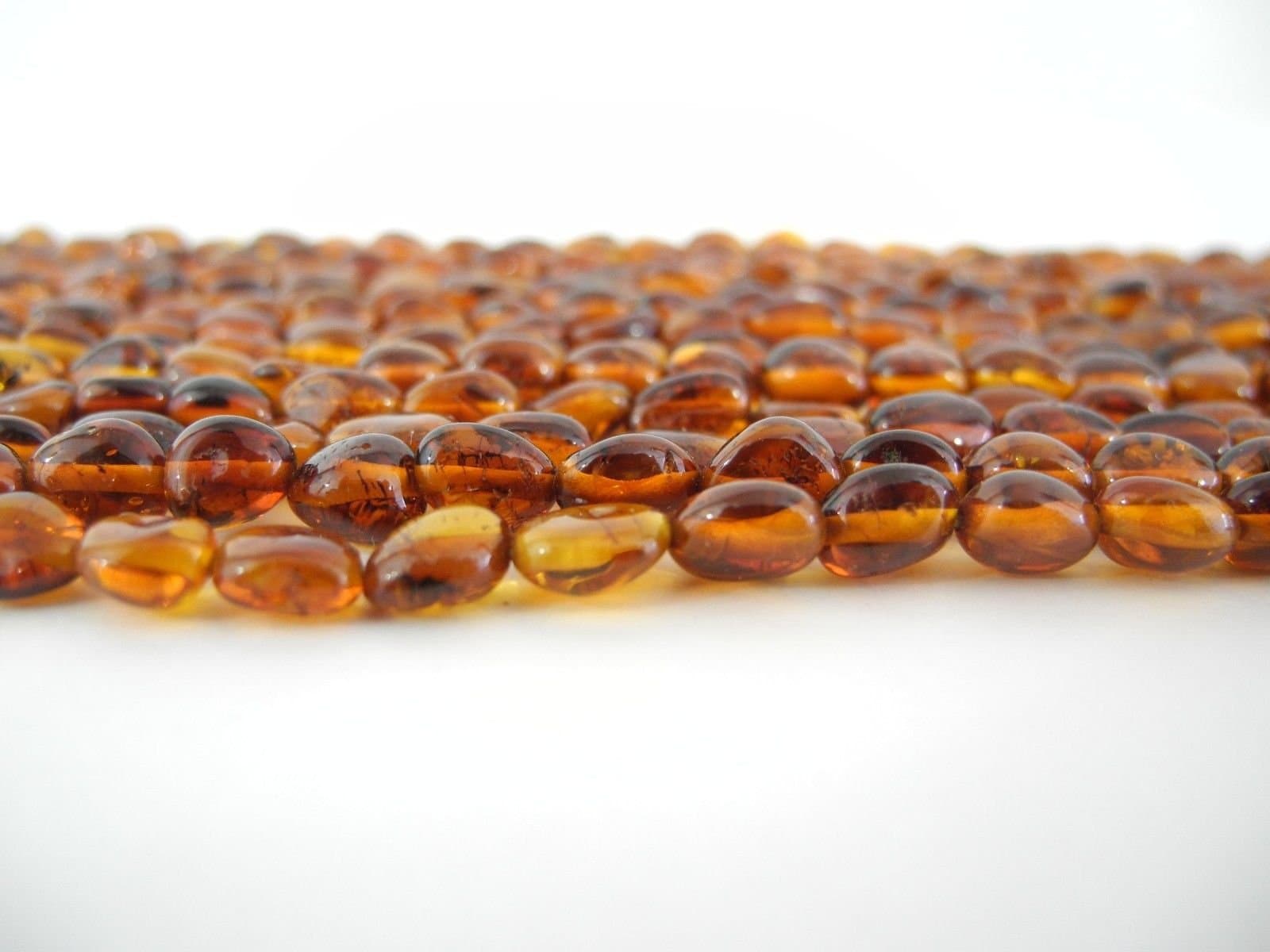 Genuine Baltic Amber Beads Strands Oval Nuggets Extra Small Cognac Alluregem 28259