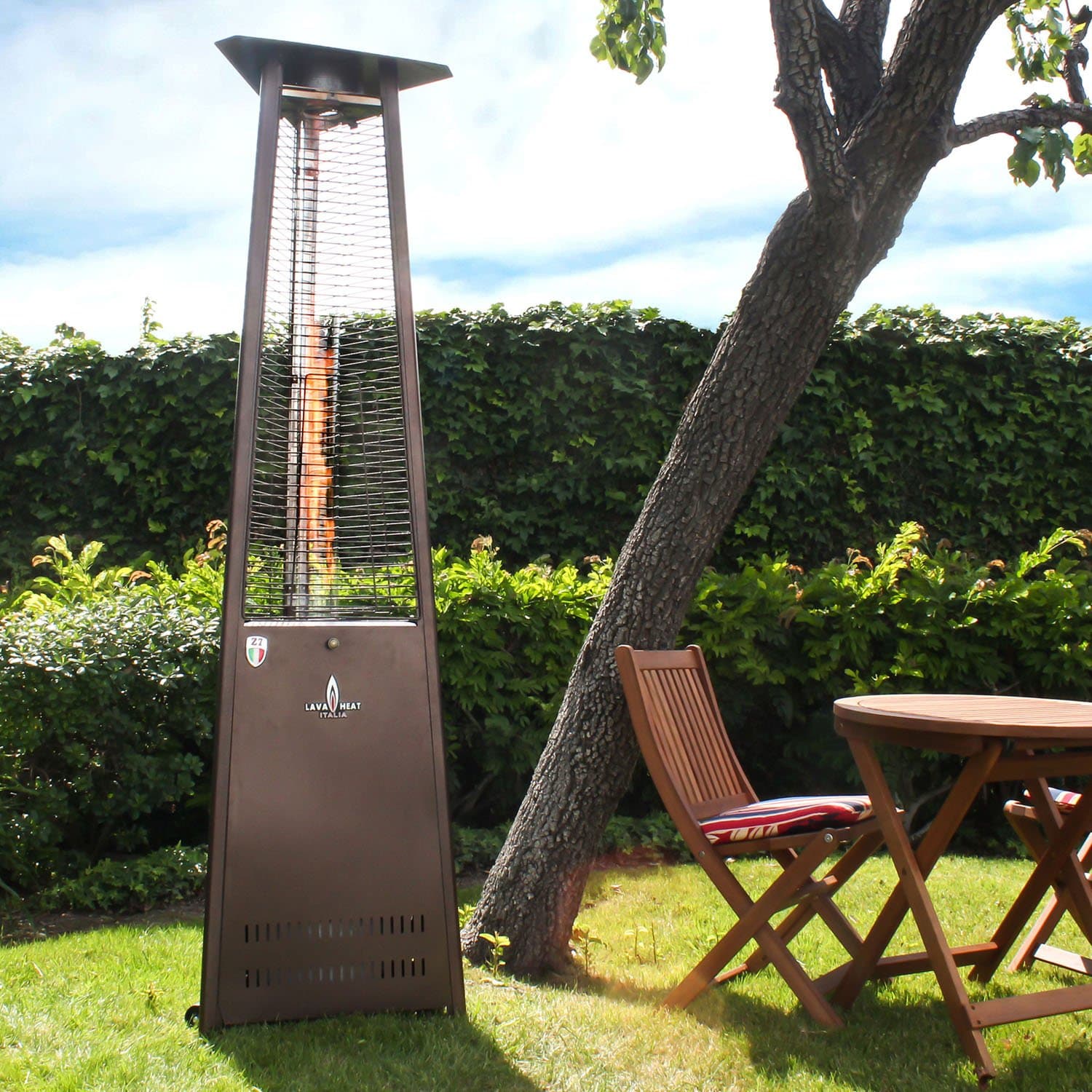 Italia 56,000 BTU Outdoor Patio Propane Tank Gas Heater with Specially Designed Borosilicate Shatter-Resistant Glass Tube, with “Easy Start” Electrical Ignition, Adjustable Flame and Heat Control, Safety "Tip-Over" Switch, Wheel Kit & Universal Infra-Red Remote Included, Hammered Bronze Finish