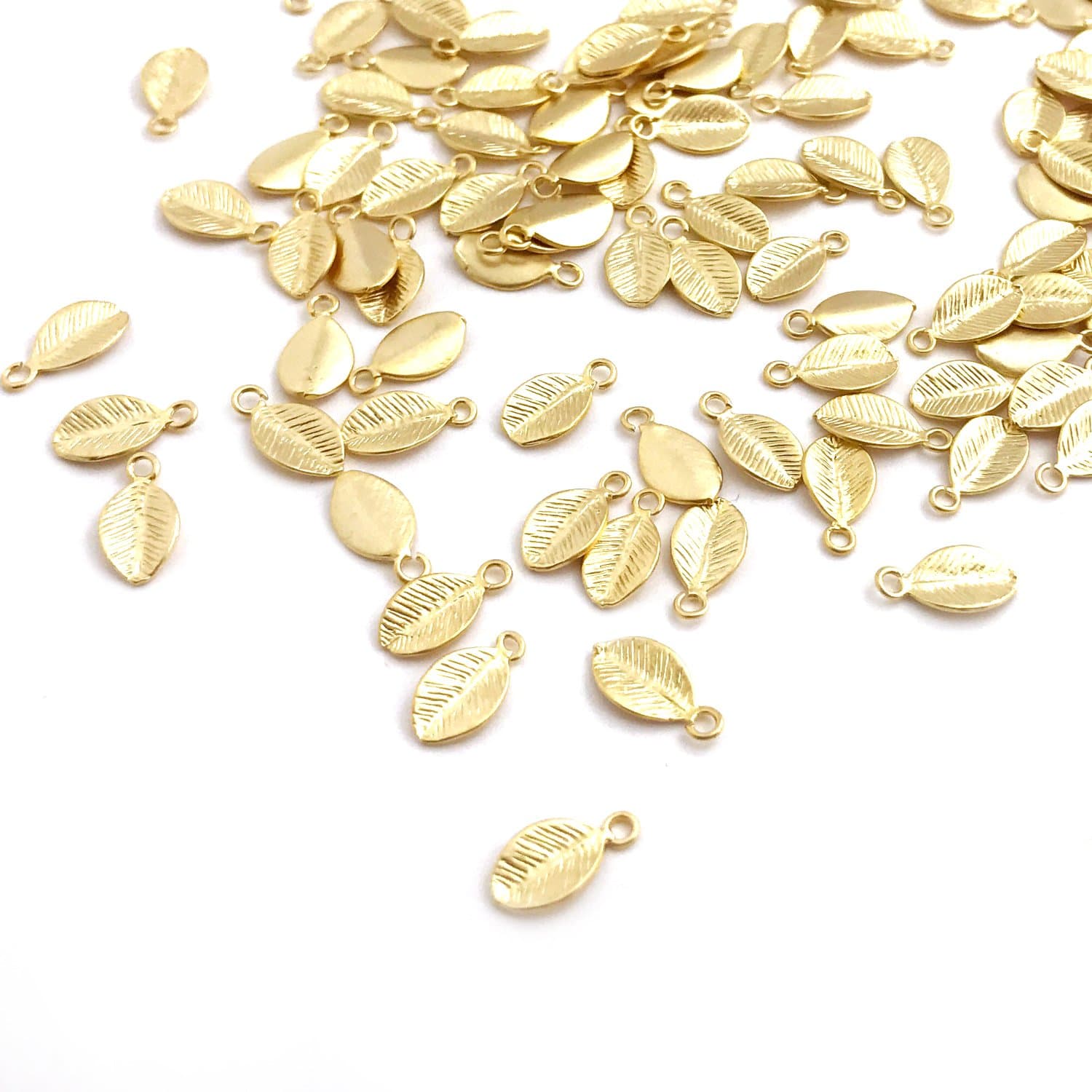 4 Pieces - 16K Gold Plated Leaf Pendants Delicate Charms Family Tree Necklace Charm Stamping Blank MignonandMignon Best Seller .19" x .39" (5mm x 10mm) - 4PL (Gold)