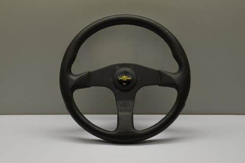 Nardi Personal Steering Wheel - Blitz - 330mm (12.99 inches) - Black Polyurethane with Black Spokes - Yellow Logo Horn Button - Part # 8474.32.2001